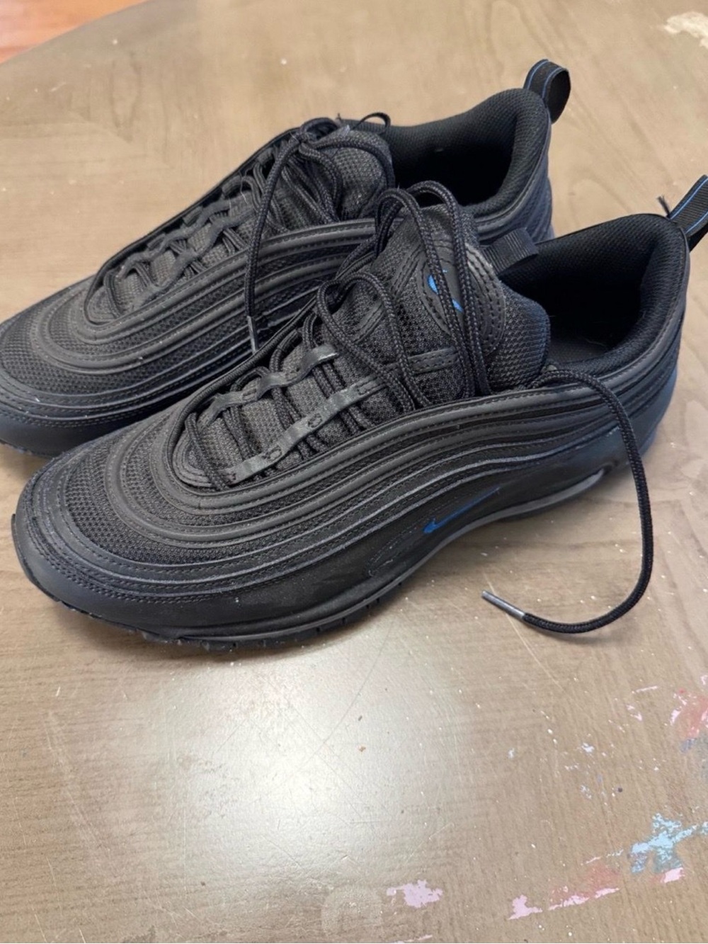 Nike Men's Air Max 97 in Black with Blue Swoosh